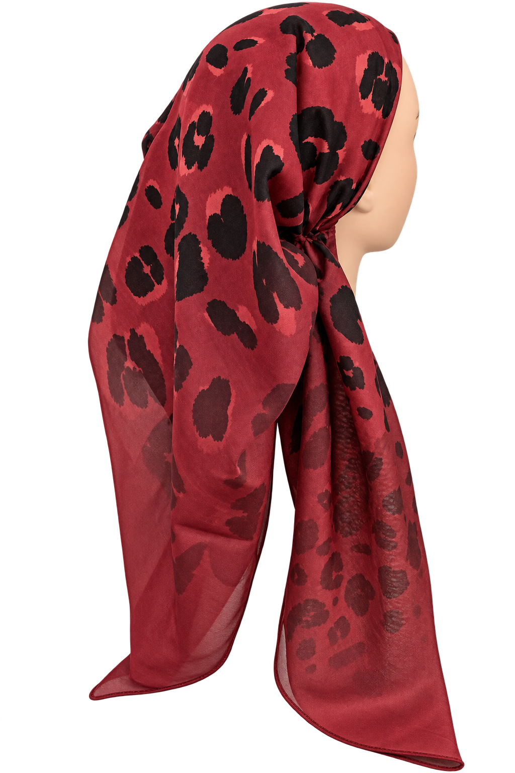 A red TICHEL with a black leopard print pattern, styled on a mannequin head against a plain white background.