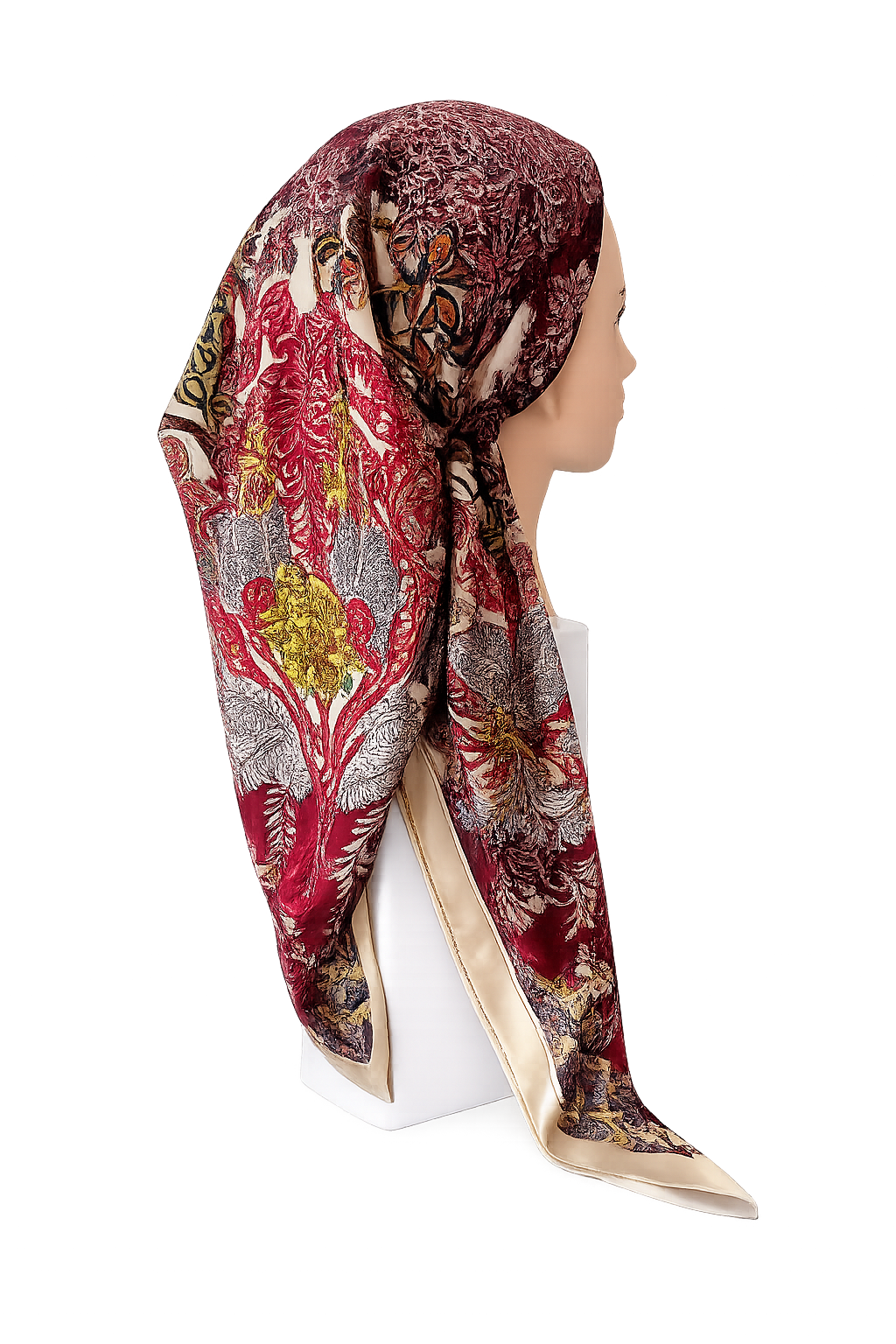 Woman wearing a patterned tichel on a white background