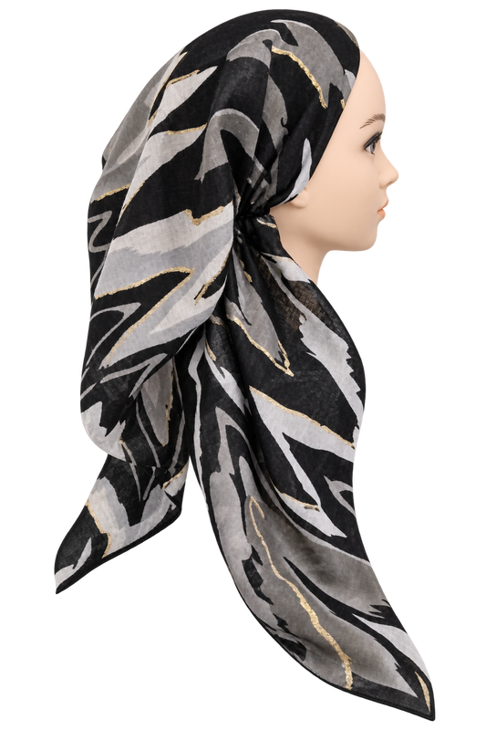 A black, gray, and white abstract patterned headscarf with thin gold lines, styled on a mannequin head in profile against a solid white background.