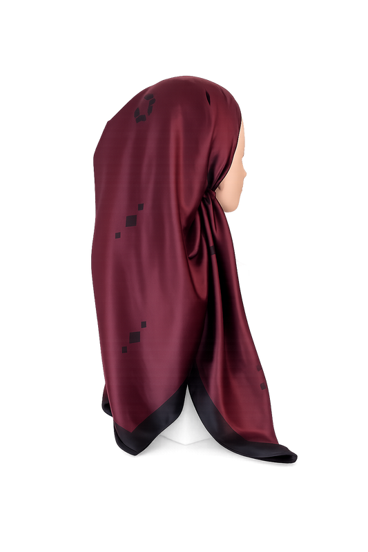 Maroon tichel with black patterns on a white background