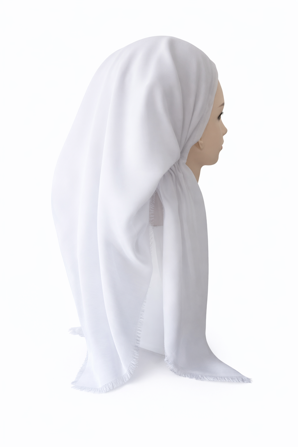 White tichel on a mannequin head against a white background