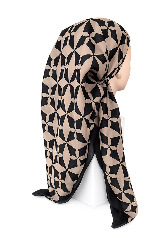 A patterned headscarf draped on a mannequin head against a plain white background. The scarf features a repeating geometric floral motif in beige and black.