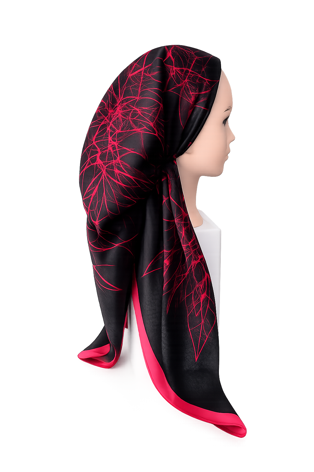 Black headscarf with red patterns worn by a mannequin on a white background