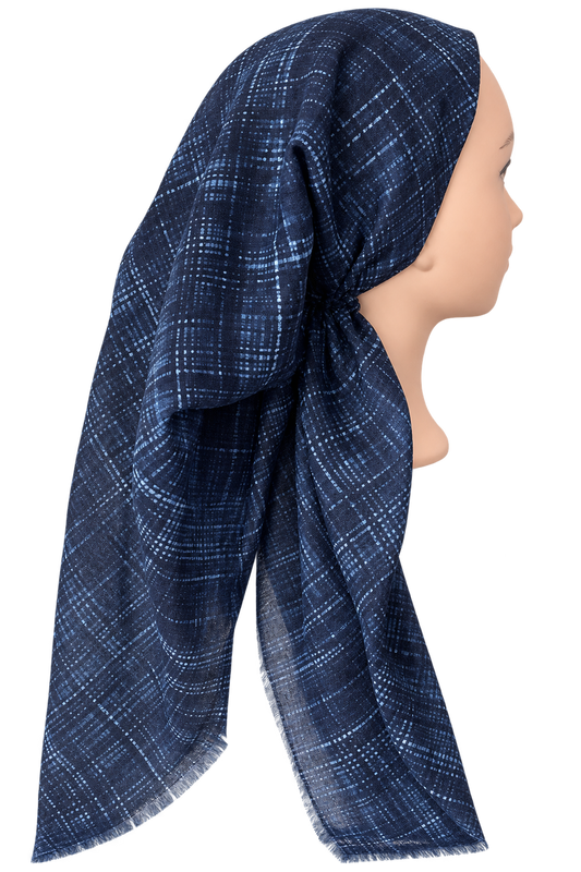 A navy blue headscarf with a white plaid pattern, styled on a mannequin head in profile against a solid white background.