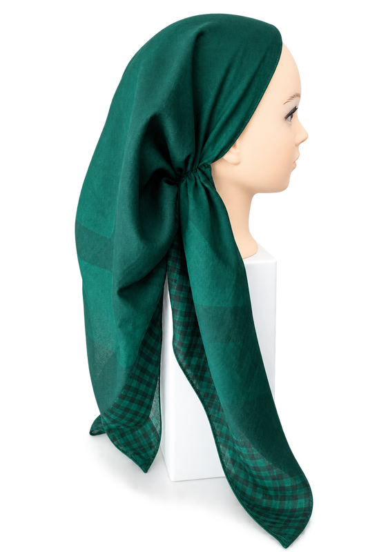 A dark green scarf with a plaid pattern, styled on a mannequin head against a white background.