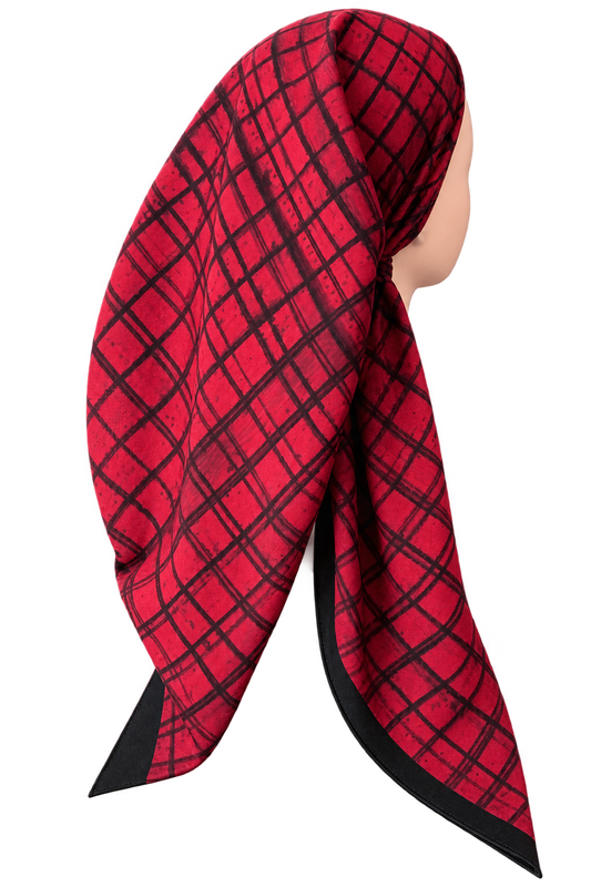 A red and black plaid patterned TICHEL wrapped on a mannequin head, shown from a side profile against a solid white background.