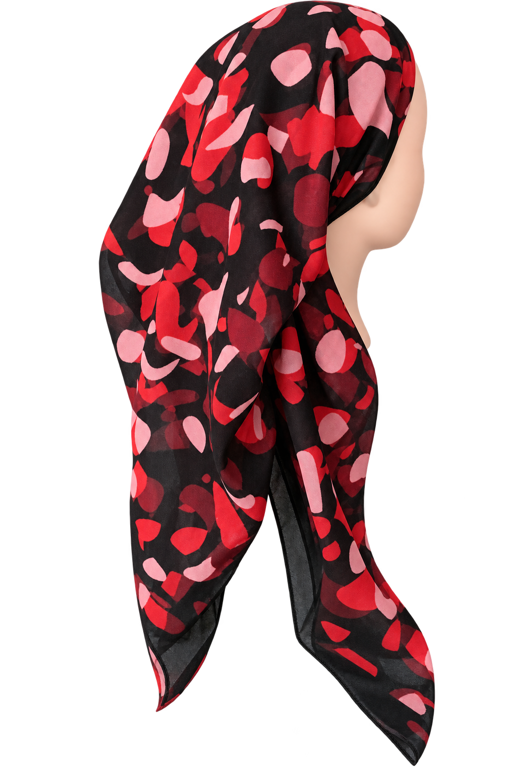 A sheer black headscarf with a red and pink abstract petal-like pattern, draped on a mannequin head against a plain white background.