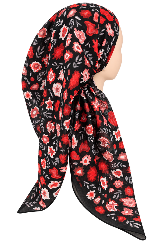 A black headscarf with a vibrant red and pink floral pattern, styled on a mannequin head against a plain white background.