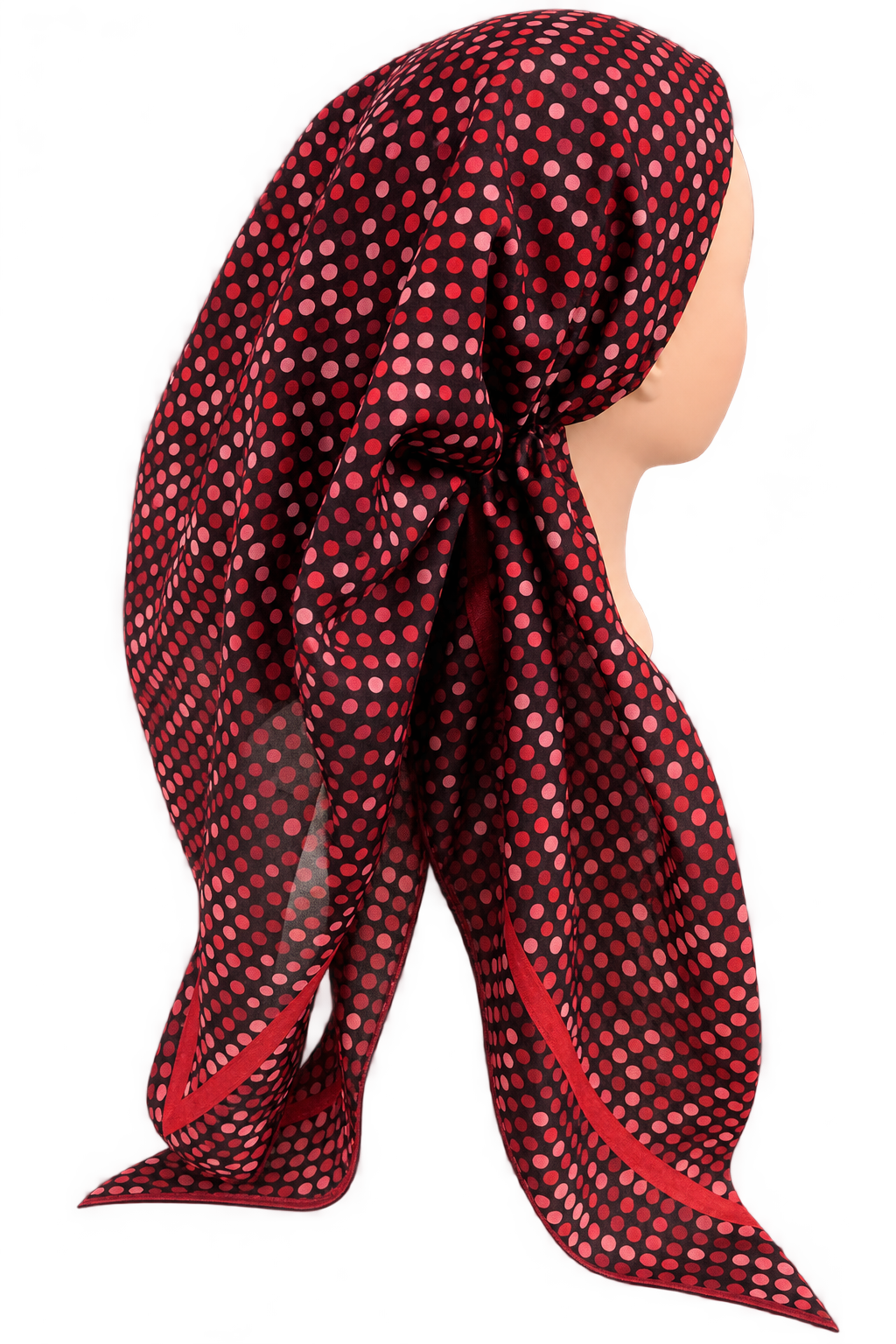 A red and black polka dot scarf styled on a mannequin head, shown from a side profile against a solid white background.