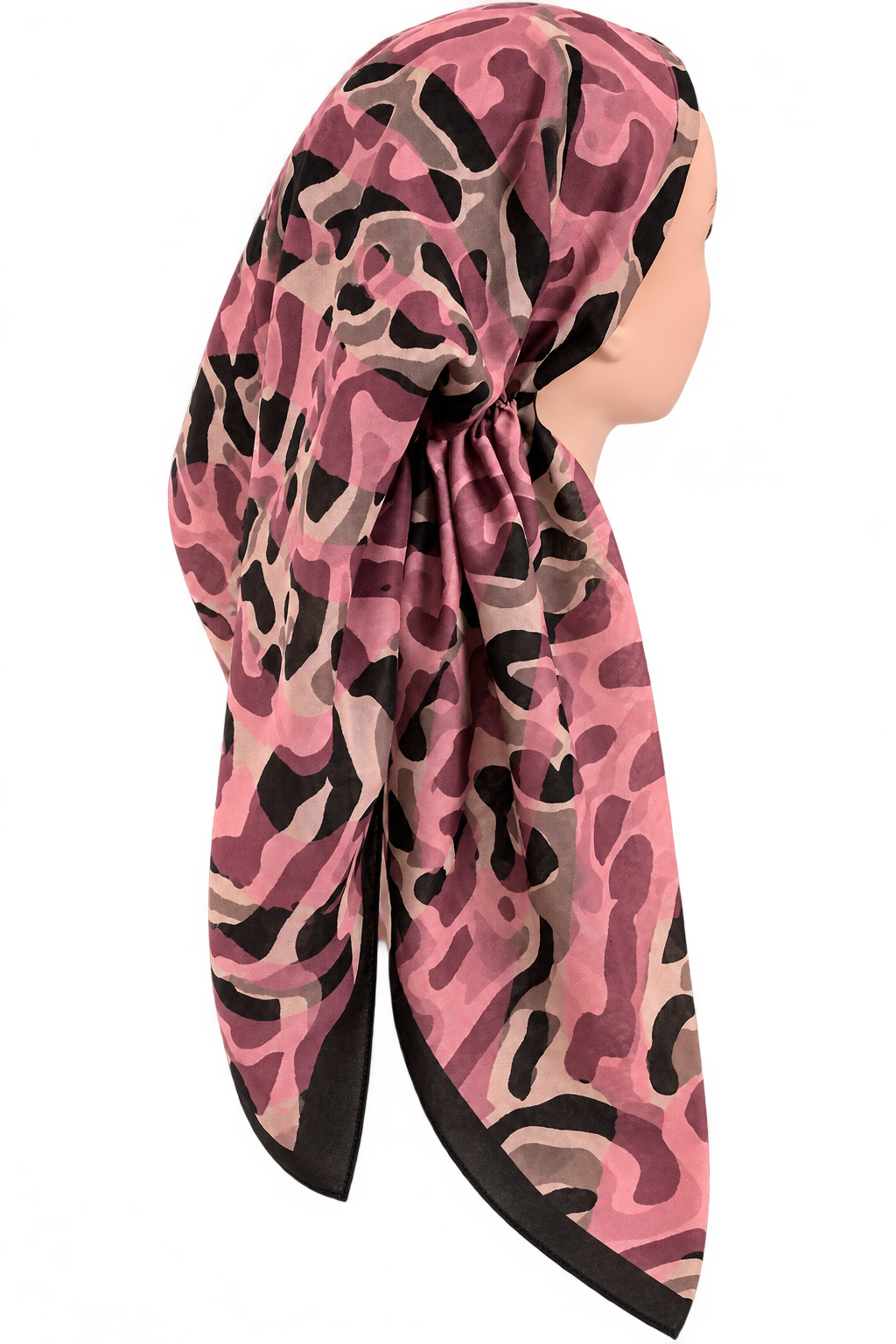 A pink and black camouflage-patterned pretied tichel scarf styled on a mannequin head, shown from a side profile against a solid white background.