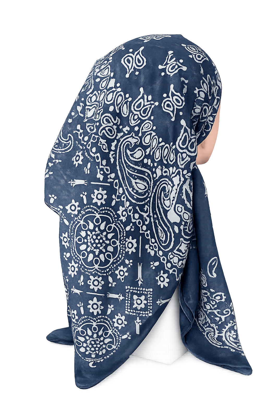 A navy blue and white paisley bandana headscarf draped on a white mannequin head against a plain white background.